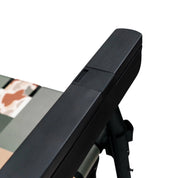 Close-up of the PARKIT × Free Fly Eclipse Recliner’s armrest featuring the first-class “push-to-recline” button system, crafted for precision comfort adjustment and ergonomic ease. Made with aircraft-grade aluminum and premium black hardware, this reclining beach and camping chair combines durability, function, and modern design, perfect for outdoor adventures or relaxing at home.