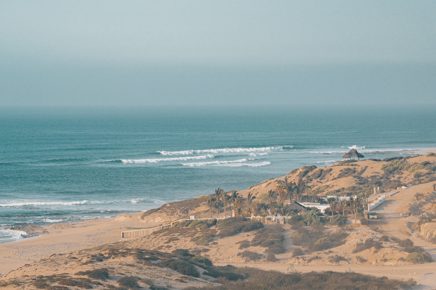 A landscape shot of the waves near La Foturna, near Cabo, just after sunrise