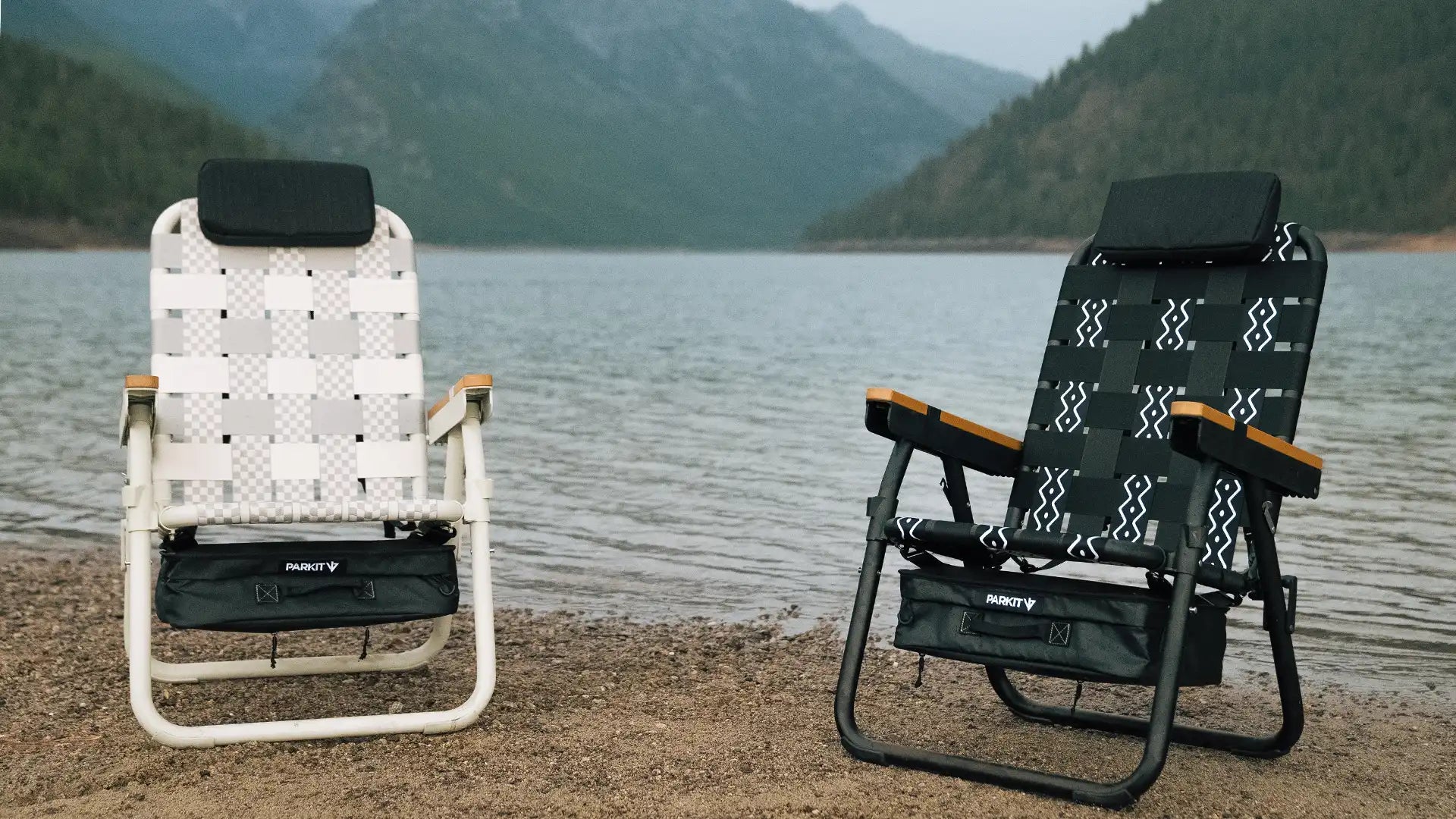 PARKIT Voyager Chair by a lakeside campfire — community-owned outdoor gear brand
