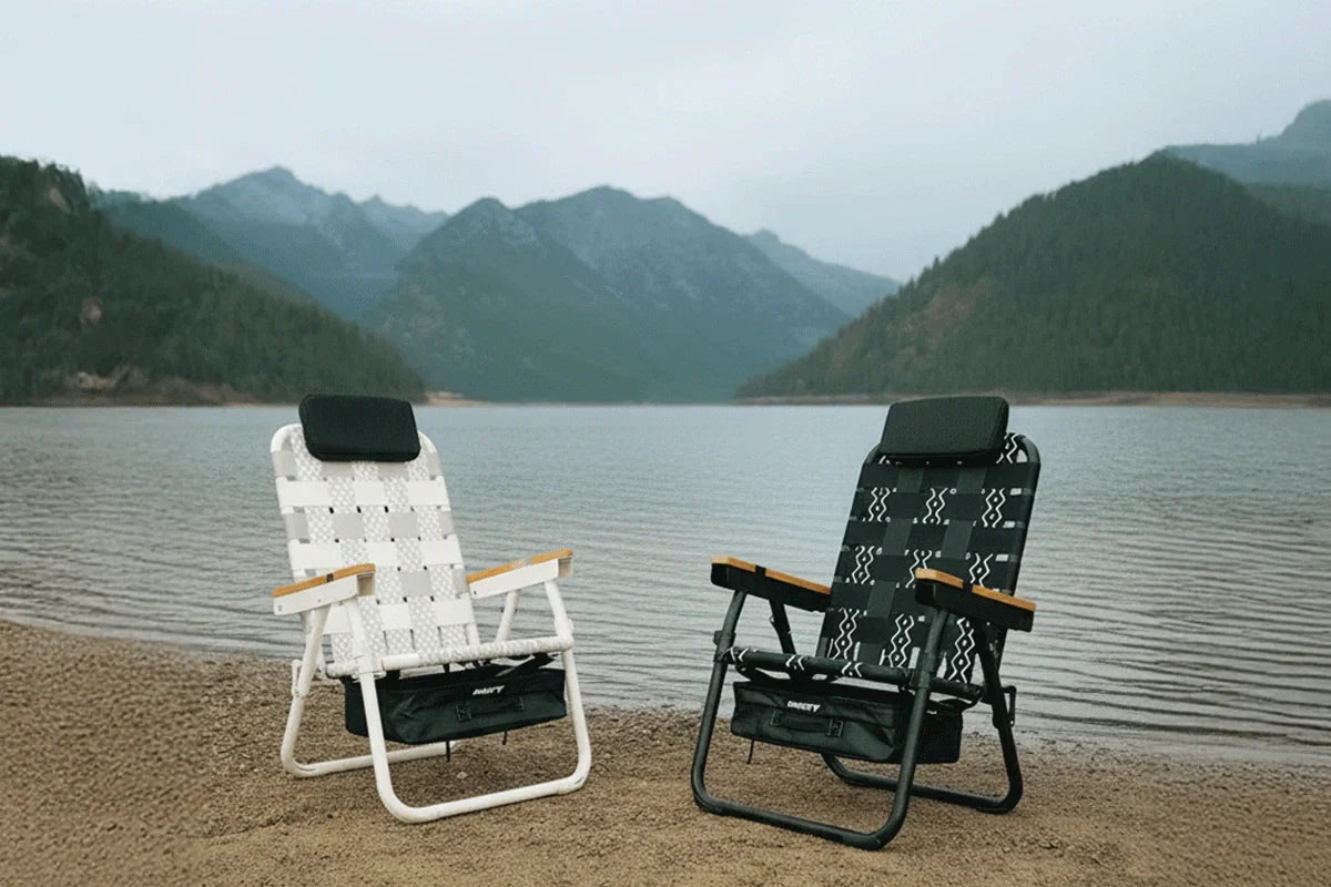 Two outdoor chairs by a campfire for a cozy evening outdoors