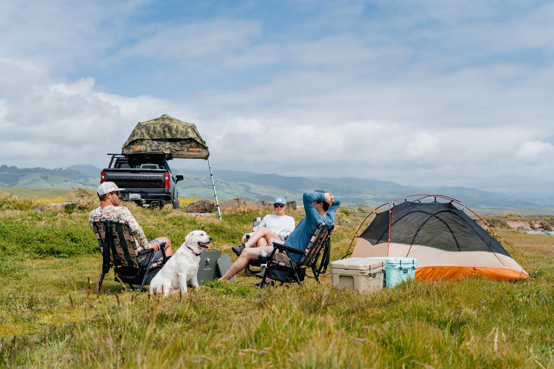 End-of-year camping trip with a peaceful campsite and chairs outdoors