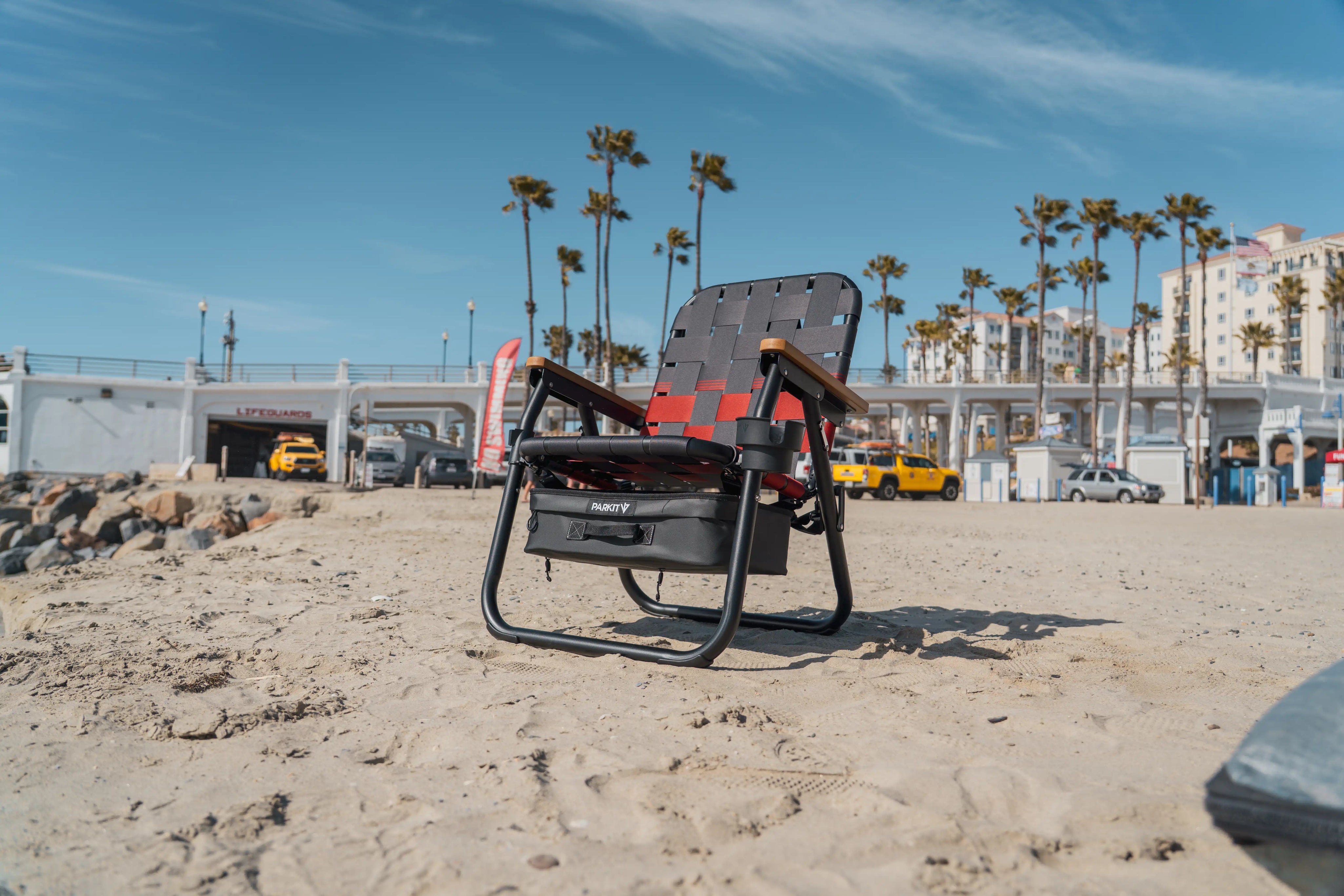 PARKIT Voyager chair set up on the beach, ready for a full day in the sun