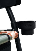 Black cup holder attached to a vehicle's cup holder with 'PARKIT' branding on a white background.