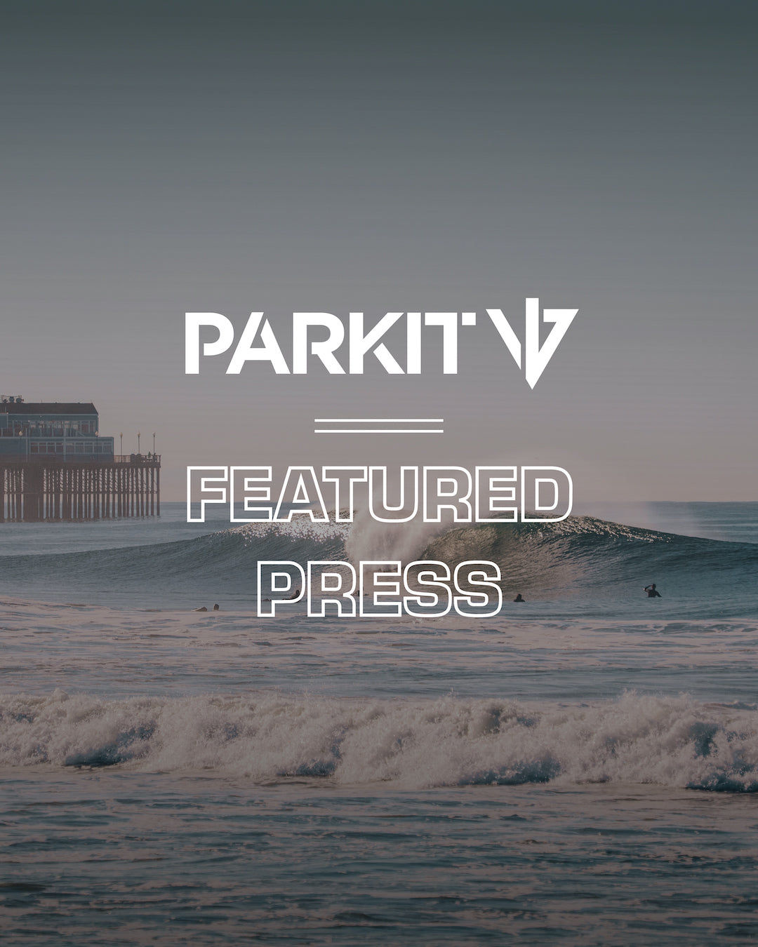 PARKIT PRESS with a breaking wave in Oceanside California, the town where PARKIT was foudned