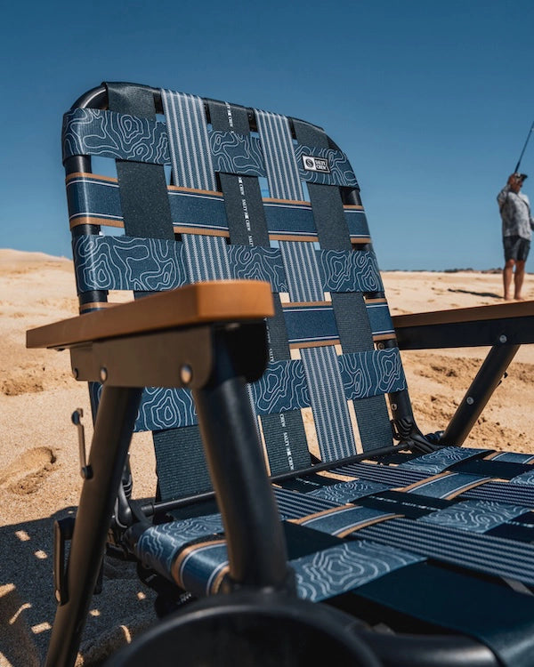 a close up of the parkit and salty crew collab chair built with stainless steel and rust proof materials to make it the perfect boat and beach chair for your summer adventures. 
