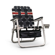 Foldable chair with black and red woven backrest on a white background