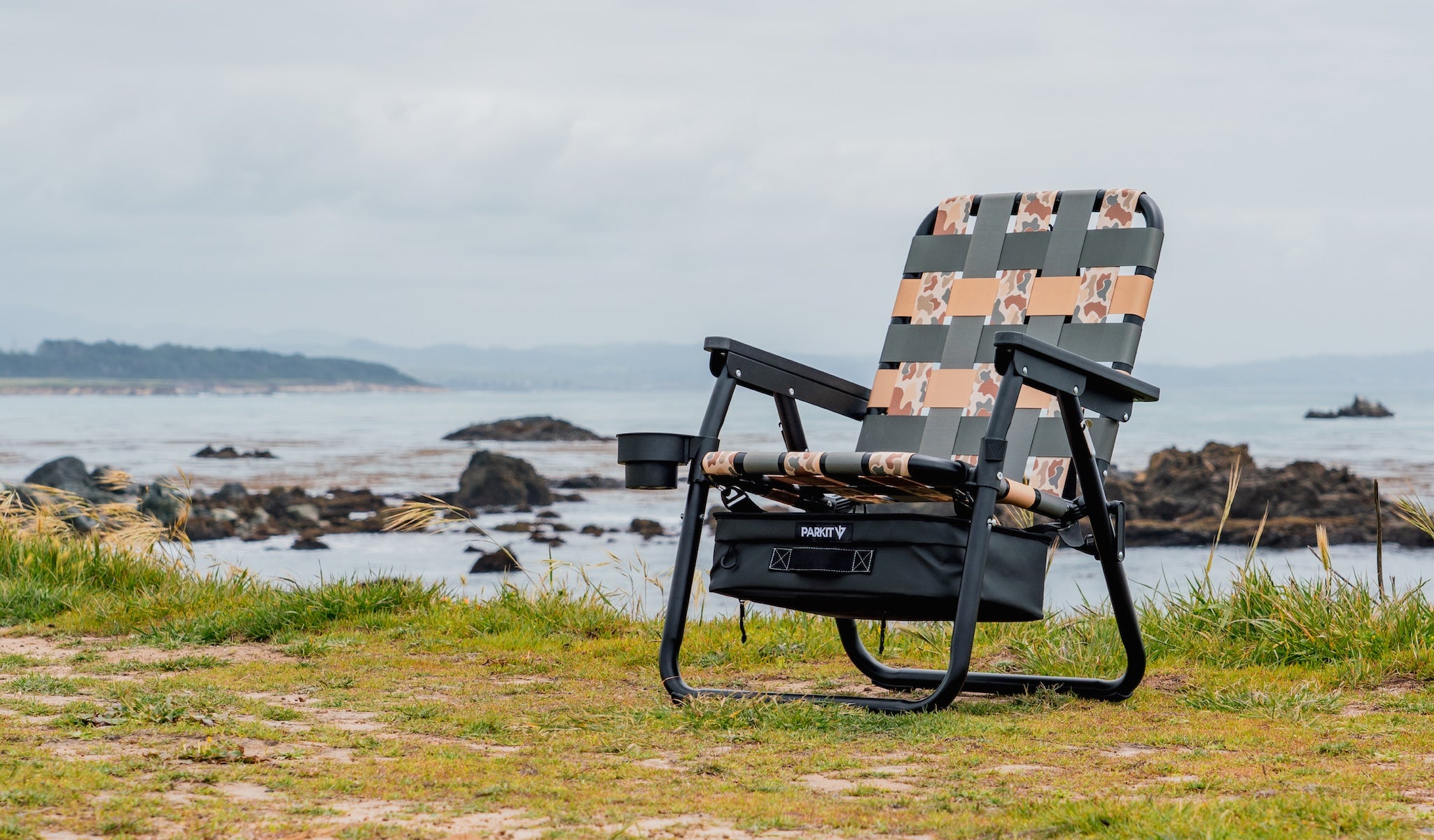 PARKIT Voyager chair in vintage camo from Free Fly sitting on the bluff overlooking california's central coastline