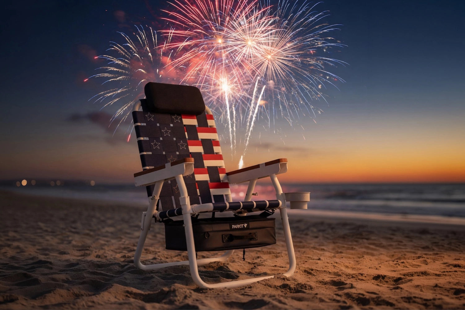 Old Glory Eclipse Recliner Chair by PARKIT which is a patter inspired by the american flag with the sunset and fireworks going off in the background.